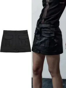 Kjolar kvinnor svart mini kjol 2024 mode kvinnlig midja midja dubbla fickor design klänning solid blixtlås rakt kort