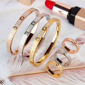 High Quality Ladies Jewelry Set Accessories Inlaid Diamonds Beautiful Stainless Steel Electroplated Gold Ring Bracelet For Women