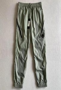 2022 SS metallo nylon uomini pantaloni una lente logo tasca con cerniera maschio pantalone esterno tuta pantaloni da jogging casual di alta qualità267O3208928