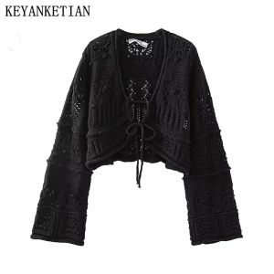 Cardigans Keyanketian Autumn New Women's Hollow Crochet Strap Sweater Short Boho Holiday Wind Flare Sleeve Black Crop Top Knit Cardigan