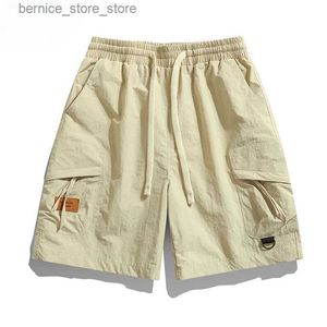 Men's Shorts Summer new mens oversized loose cotton five point pants with multiple pockets Y2K mens clothing shorts Q240305