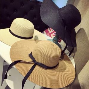 Cappelli di paglia estivi a tesa larga Cappelli da sole grandi per le donne Protezione UV Panama Cappelli da spiaggia flosci Cappello da donna con fiocco Protezione solare Pieghevole Sun307l