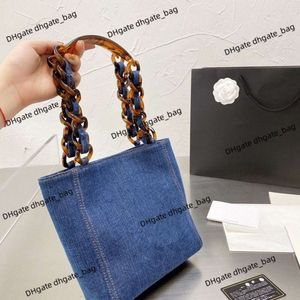 Women's luxury shopping bag Designer handbag 90% hot sales Fashion new denim medieval Tote bag single shoulder handbag casual all-match large capacity glass chain bag