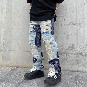 Jeans da uomo Primavera Y2K Abiti vintage strappati da uomo Pantaloni alla moda con giunzioni incrociate Streetwear Pantaloni larghi dritti per uomo