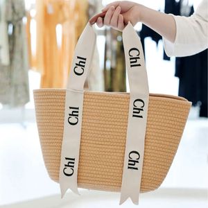 Lüks Straw Rafias Sepet Drawstring Shopper Bag Tasarımcı Çanta Pochette Hafta Sonu Çanta Kadınlar Erkek Dokunma Tote Mağazası Crossbody Bags Moda Üst Tasarlı Omuz Çantası