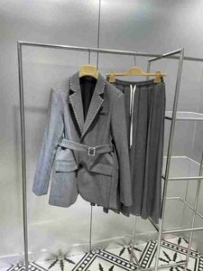 designer Shenzhen Nanyou fascia alta Miu casa all'inizio della primavera pendolarismo alla moda semplice dignitoso senior vestito grigio gonna vestito VIMJ