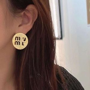 Big version mi earrings round gold silver lettering hollow vintage French high sense earrings female Japanese and Korean silver 2024