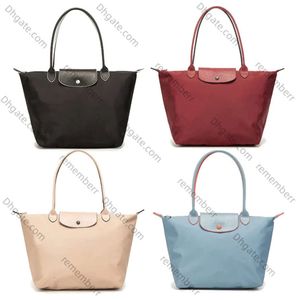 2024 Designer Mini grande borsa pieghevole con gnocchi Borsa a tracolla di lusso con tracolla Shopper da donna Borsa da città da uomo con frizione Borsa da viaggio in pelle di nylon per il fine settimana