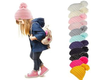 Beanie Kids Örgü Şapkalar Çocuk Tıknaz Kafatası Kılps Kış Kablosu Örgü Sarkık Tığ Şapkaları Açık Sıcak Beanie Cap 11 Renkler 50pcs2838537