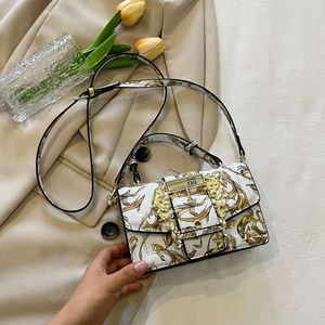 Ny 2024 mångsidig textur liten fyrkant för kvinnor handväska unikt modemålade tryck en axel handhållen crossbody väska