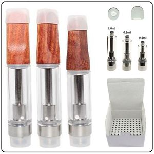 Ahşap Th205 Atomizer Ahşap Seramik Cam Vape Kartuşları 0.5ml 0.8ml 1.0ml 510 iplik vidası üst boş arabalar köpükle paketlenmiş