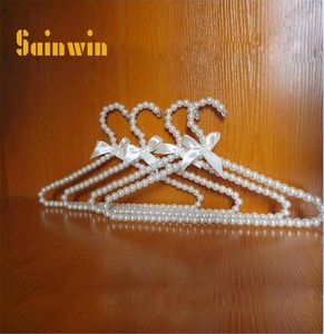 SAINWIN 10PCSLOT 30CM20CM BARN Pearl Baby Hangers For Kids Plastic Cloth Hanger Children Rack 2011114969719