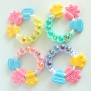 Sonaglino per bambini colla per denti sonaglio a mano per bambini lenitivo anello per morso in silicone combinazione smerigliatrice per denti all'ingrosso