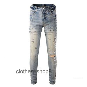 Denim amirs jeans designer calças homem outono 869 moda 2024 novo am azul carta quebrada graffiti tendência magro ajuste masculino cfi9