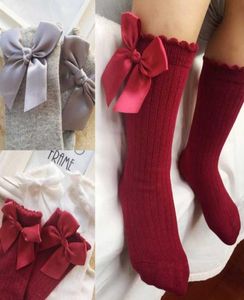 04Y Spring Autumn Baby Socks Solid Warm Baby Girl Kne High Socks with Bow Sweet Long Tube barnstövlar Vertikala randiga Sokken3792535