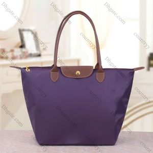 2024 Evening Bags High Quality Classic Portable Foldable Dumpling Handbag Woman Travel Lightweight Shopper Waterproof Nylon Shoulder Sac 230314 10A