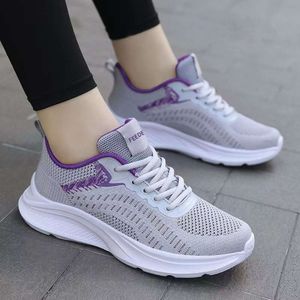 Fyra andningsbara nya säsonger Flying Sports Casual Weaving Womens Bekväma Fashion Single Running Shoes 293