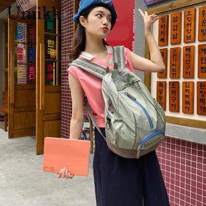 Sacos escolares Bolsa de ombro de nylon casual bolsas vintage cor sólida mochila de estudante macia para viagens de escritório coreana