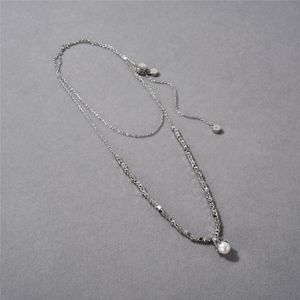 Unik och trendig personlighet, kopparpläterad platina oregelbundna silverskärmar Pull-out Pearl Pendant Hollkedja Fashionabla halsband