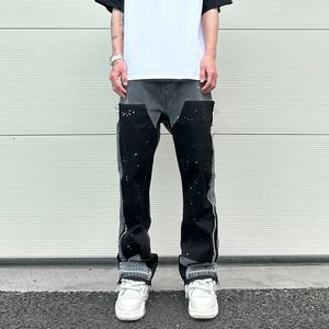 Graffiti svart blossed denim byxor mens vintage hip hop lappar stänkade bläck breda ben jeans y2k baggy tvättade jeans för män 240304