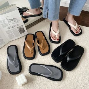 Women's summer fashion outer wear non-slip new Internet celebrity beach solid color flat bottom flip-flop sandals with a poop-feeling feel