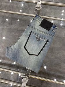 メンズデザイナージーンズジーンズのトレンドが苦しんでいるブラックリッピングバイカースリムフィットオートバイマンスタックジーンズの男性バギージーンズ