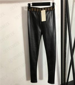 Leggings in pelle PU Pantaloni collant per le donne Lettera nastro elastico stretto signore vita alta slim fit pantaloni sottili all'interno più velluto1955182