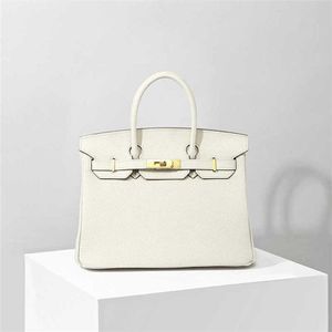 70% Factory Outlet Off leather top layer women's lychee grain bag 30CM25CM on sale