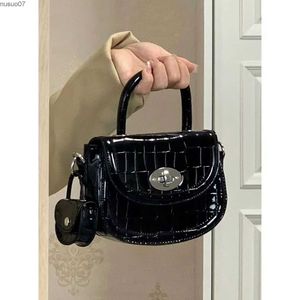 Messenger Bags Fashion Version Saddle Bag 2024 Ny Korean Classic Black Crocodile Pattern Womens Handväska Bag Avancerad Sense Shoulder Bagsl2403