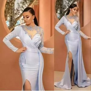 Ny sexig elegant arabisk aftonklänningar juvel hals illusion kristall pärlor långa ärmar sjöjungfru sida split ljus blå prom klänningar special ocn klänning