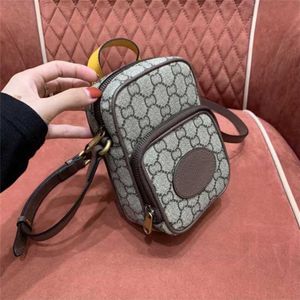 % 70 Fabrika Outlet Kapalı Orijinal Deri Kaplan Kafası Cep Telefon Crossbody Küçük Yaz Popüler Mini Çok Yönlü Kadın Çantası Satışta