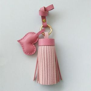 Märke lyxläder tassel hjärta diy nyckelchain charms svart för kvinnor bulk väska hänge handväska tillbehör söt gåva grossist 240301