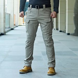 Outdoor tactical pants mens slim fit elastic multi bag waterproof and wearresistant workwear 240305