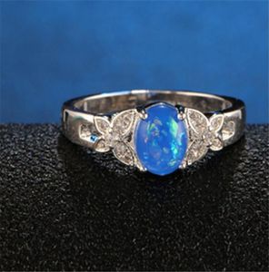 Bröllopsringar Silver Ring Classic utsökta temperament Kvinnliga modeller med rund inlagd OPAL Stone Zircon Hand Jewelry34444469