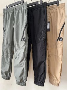 2024 Mens Pants Sports Leisure Nylon Pants Zipper Solid Color Quick Drying Waterproof Pants Mens Lens Goggle Pants 230226