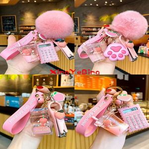 Keychains Creative Milk Bottle Crystal Keychain Cute Hairy Ball Flowing Liquid Key Chain Computer Nail Clipper Bag Pendant221J