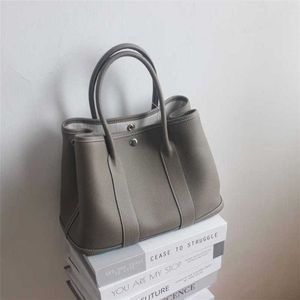 70% Fabriksuttag från fyra säsonger General Purpose Casual Mångstile Layer Cowhide Portable Garden Capacity Full Leather Female Bag in och till försäljning