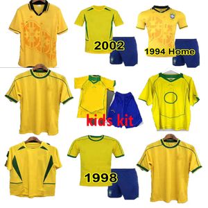 Kids Man Kit 1994 1998 2002 Brazll Retro Soccer Jersey Ronaldo Romario Kaka Ronaldinho Rivaldo Maillot de Futol R.Carlos Бразийская футбольная рубашка бразильская футбольная рубашка