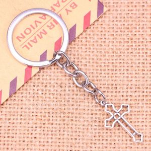 Nyckelringar 20st Fashion Keychain 25x15mm Hollow Cross Pendants Diy Men smycken bil nyckelkedja ringhållare souvenir för gåva