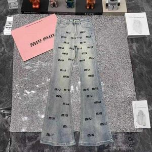 Projektant MI24 Springsummer Nowy modny i modny pełny druk gorący diament Dekoracyjne umyte stare stary talia dżinsowe spodnie kxni
