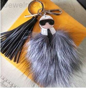 Luxury Fluffy Karl äkta Raccoon Fur Pompom Monster Bag Bugs Charm Keychain Plush Key Ring Leather Tassel Pompom20Z1