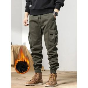 Pantaloni 2024 Nuovi pantaloni cargo invernali da uomo Multitasche con coulisse Fodera in pile spessa tuta calda Jogging Pantaloni termici in cotone casual