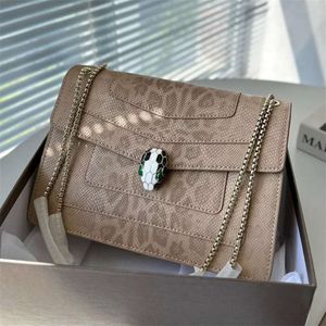 Новые женщины -дизайнерские сумки на плечах Sparkling Snake Skinbags Модные кожаные кросс -мешок для тела