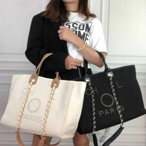 70% Factory Outlet Off Женская ручная парусиновая пляжная сумка Tote Сумки Классические женские сумки большой емкости Маленькие цепочки Большая сумка через плечо 6LD5 в продаже