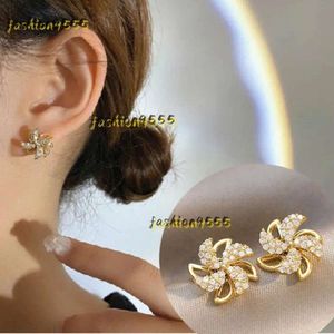 Stud Stud Earrings Crystal Windmill Rotating Leaf Ear Studs Double Snowflake Earring Celebrity Temperament Designer Earrings Jewelry Womens Party Jewelry 2024