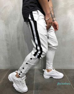 Tre barre stampate Slim Haren Sport Pantaloni a matita Uomo Pantaloni da jogging Palestra Abbigliamento sportivo da uomo Pantaloni da corsa Pantaloni da jogging Pantaloni sportivi da uomo XM014880150