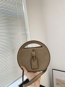 24SS Womens Luxury Designer New Round Pie Bag liten Apple Handbag Shoulder Crossbody Coin Purse och Cute 21cm