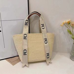 2024tote Bag Designer 2024 New Vacation Style Grass Woven Tote Fashion Large Capacity Beach Leisure Handheld Cabbage Basket