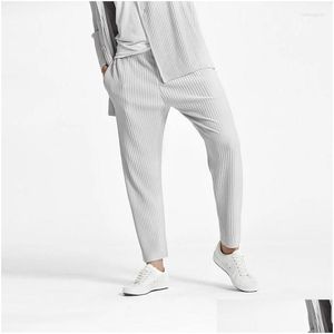 Pantaloni da uomo Uomo Estate 2022 Miyake Pieghevole Moda Plus Size Giappone Pieghettato Crop Alta flessibilità Drop Delivery Abbigliamento Abbigliamento Dhabb