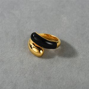 Nuovo anello per gioielli Anello a doppia testa in oro nero smaltato con smalto a goccia Anello in ottone placcato oro 18 carati a contrasto di colore per le donne in Europa e America